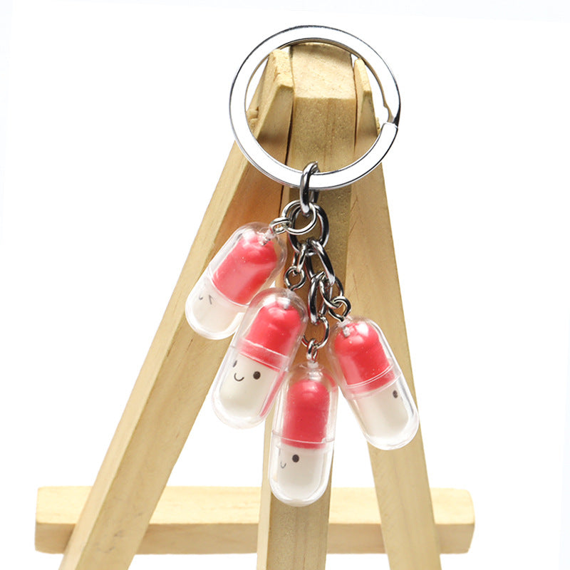 Wholesale Acrylic Cute Smiley Face Capsule Pendant Keychain